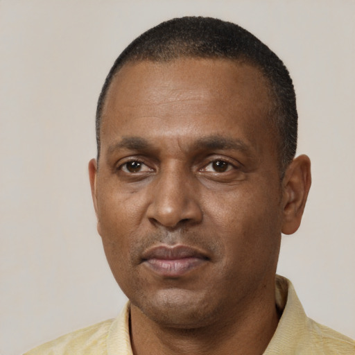 Neutral black adult male with short  brown hair and brown eyes