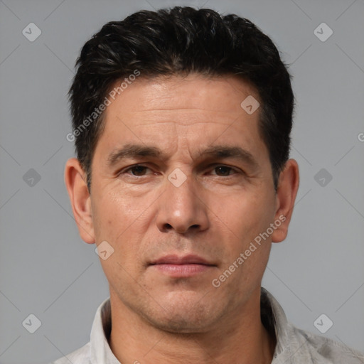 Neutral white adult male with short  black hair and brown eyes