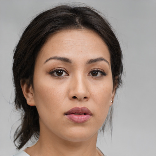 Neutral white young-adult female with medium  brown hair and brown eyes