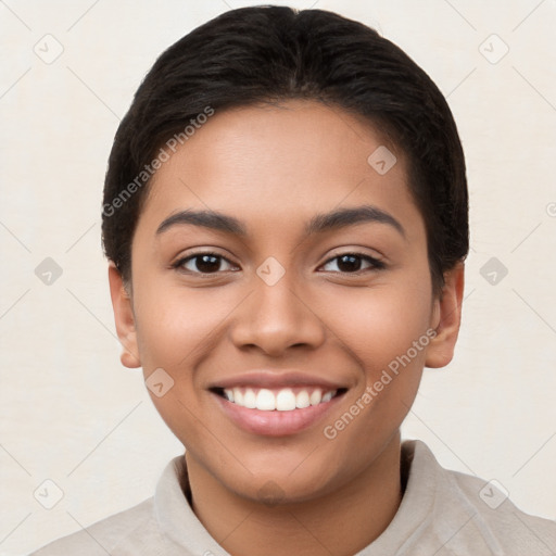 Joyful latino young-adult female with short  brown hair and brown eyes