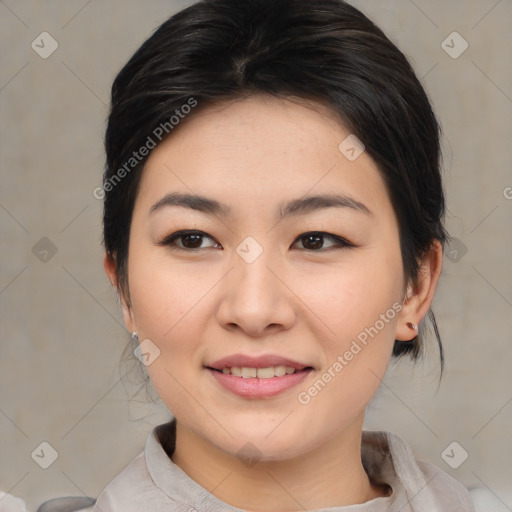 Joyful asian young-adult female with medium  brown hair and brown eyes