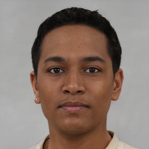 Neutral black young-adult male with short  black hair and brown eyes