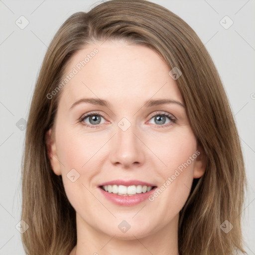 Joyful white young-adult female with long  brown hair and green eyes