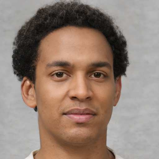 Neutral black young-adult male with short  brown hair and brown eyes