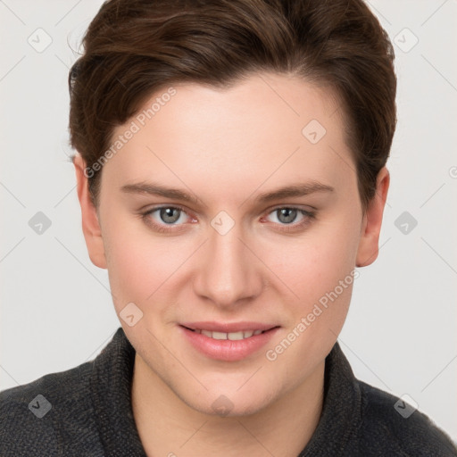 Joyful white young-adult female with short  brown hair and grey eyes