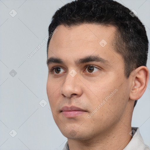 Neutral white young-adult male with short  black hair and brown eyes