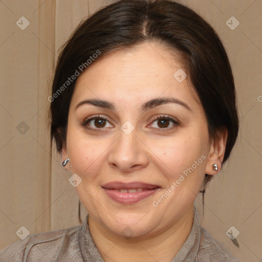 Joyful white adult female with medium  brown hair and brown eyes