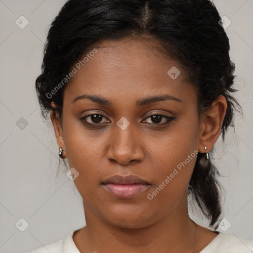 Neutral black young-adult female with medium  black hair and brown eyes