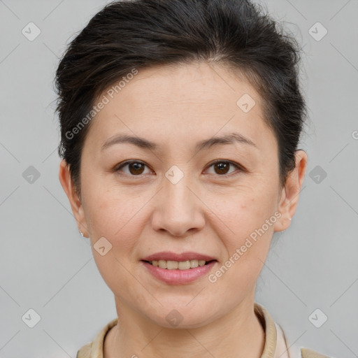 Joyful white adult female with short  brown hair and brown eyes