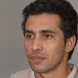 Neutral white adult male with short  black hair and brown eyes