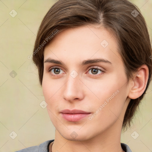 Neutral white young-adult female with medium  brown hair and brown eyes