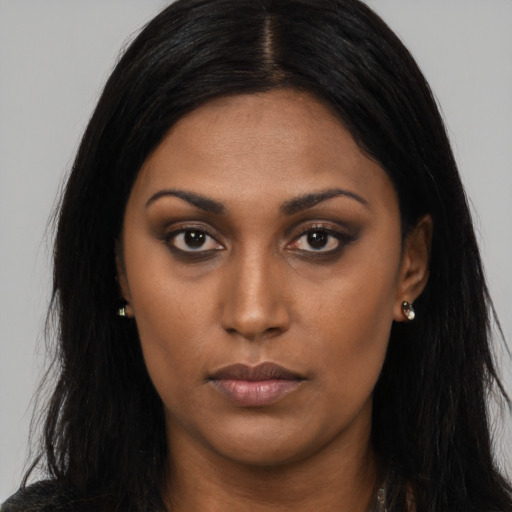 Neutral asian young-adult female with long  brown hair and brown eyes