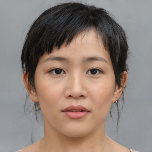 Neutral asian young-adult female with medium  brown hair and brown eyes
