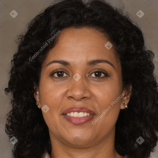 Joyful latino adult female with long  brown hair and brown eyes