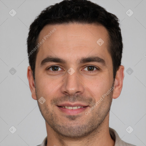 Joyful white young-adult male with short  black hair and brown eyes