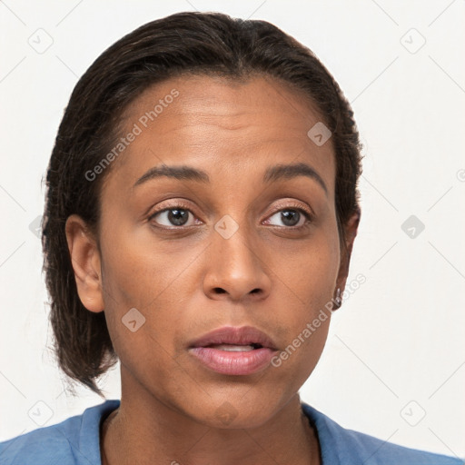 Joyful white adult female with short  brown hair and brown eyes