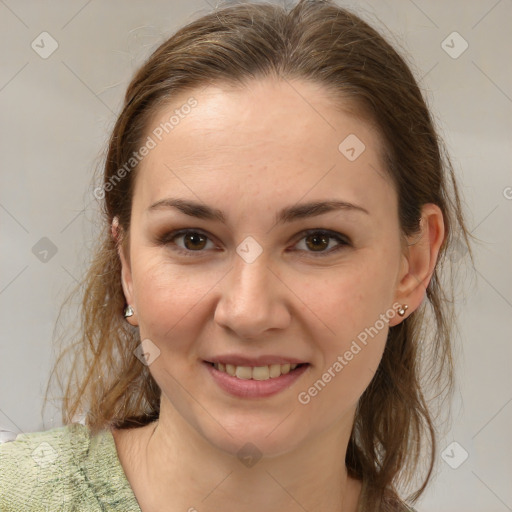 Joyful white young-adult female with medium  brown hair and grey eyes