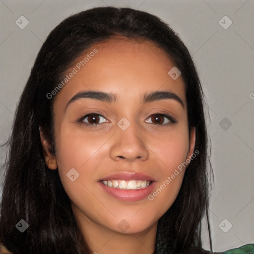 Joyful latino young-adult female with long  black hair and brown eyes