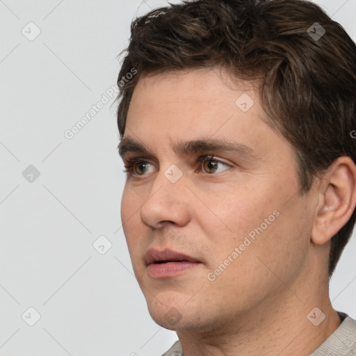 Neutral white adult male with short  brown hair and brown eyes