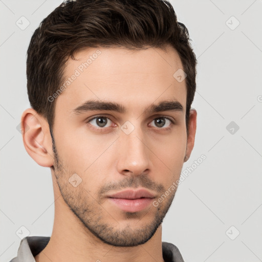 Neutral white young-adult male with short  brown hair and brown eyes