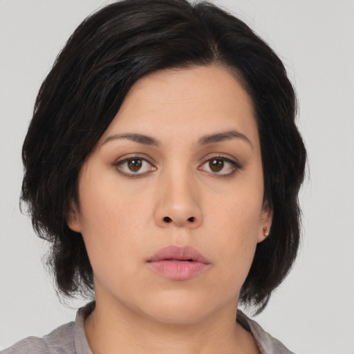 Neutral asian young-adult female with medium  black hair and brown eyes