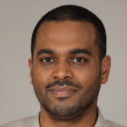Neutral black young-adult male with short  black hair and brown eyes