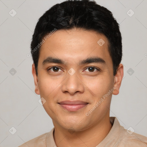 Joyful latino young-adult male with short  black hair and brown eyes