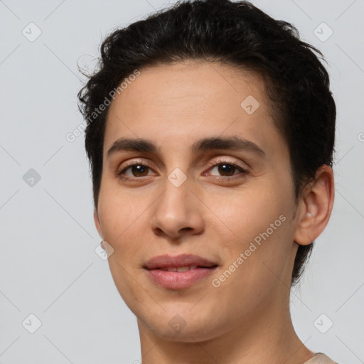 Joyful white young-adult female with short  brown hair and brown eyes