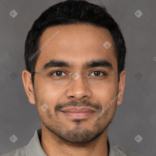 Joyful latino young-adult male with short  black hair and brown eyes