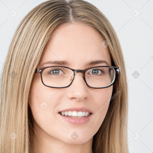 Joyful white young-adult female with long  brown hair and green eyes