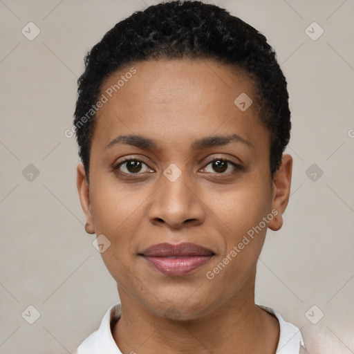 Joyful latino young-adult female with short  black hair and brown eyes