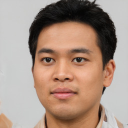 Neutral asian young-adult male with short  black hair and brown eyes