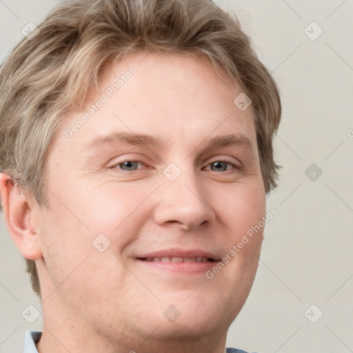 Joyful white adult male with short  brown hair and grey eyes