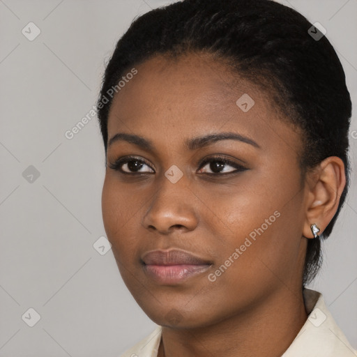 Neutral black young-adult female with short  black hair and brown eyes