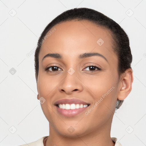 Joyful latino young-adult female with short  brown hair and brown eyes