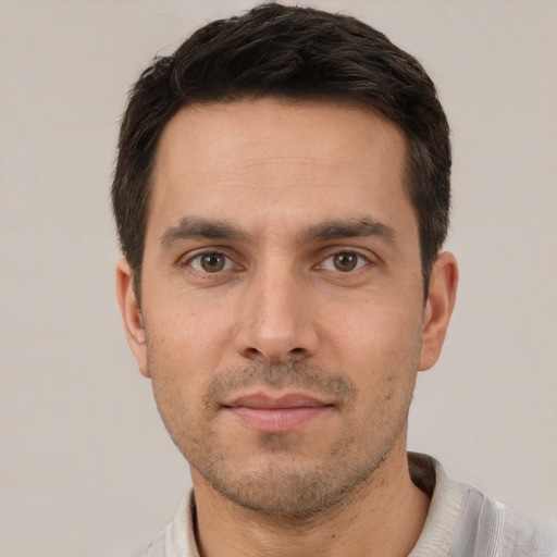 Neutral white young-adult male with short  brown hair and brown eyes