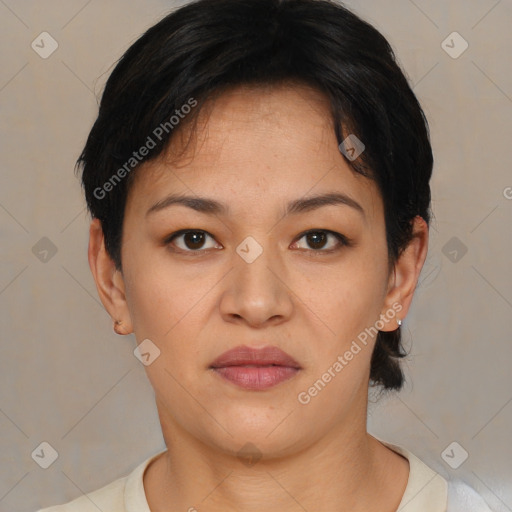 Joyful asian young-adult female with short  black hair and brown eyes