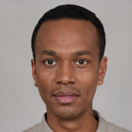 Neutral black young-adult male with short  black hair and brown eyes