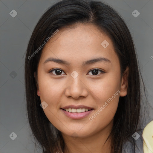 Joyful white young-adult female with long  brown hair and brown eyes