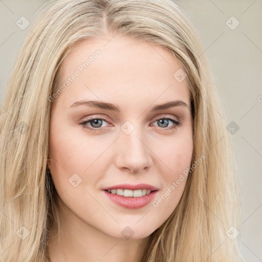 Joyful white young-adult female with long  brown hair and blue eyes