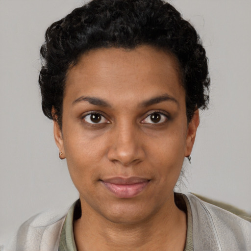 Neutral black young-adult female with short  black hair and brown eyes