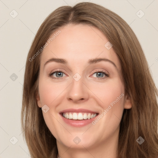 Joyful white young-adult female with long  brown hair and green eyes