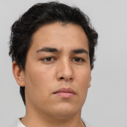 Neutral asian young-adult male with short  brown hair and brown eyes