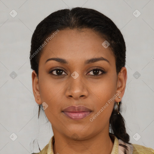 Joyful black young-adult female with short  brown hair and brown eyes