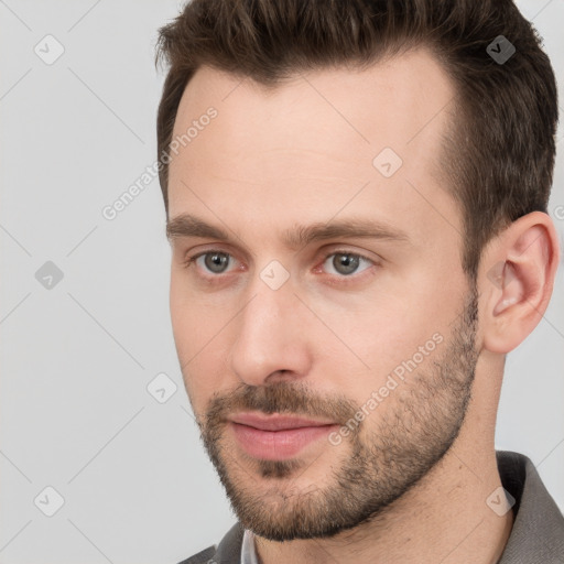 Neutral white young-adult male with short  brown hair and grey eyes