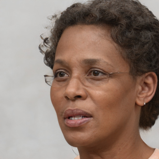 Neutral white adult female with short  brown hair and brown eyes