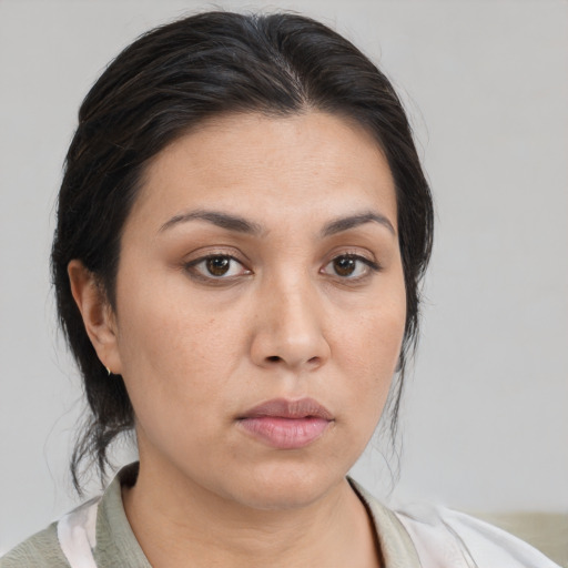 Neutral asian young-adult female with medium  brown hair and brown eyes