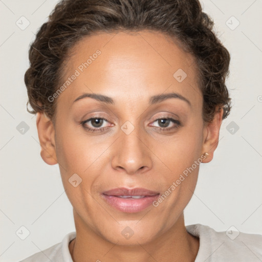 Joyful white adult female with short  brown hair and brown eyes