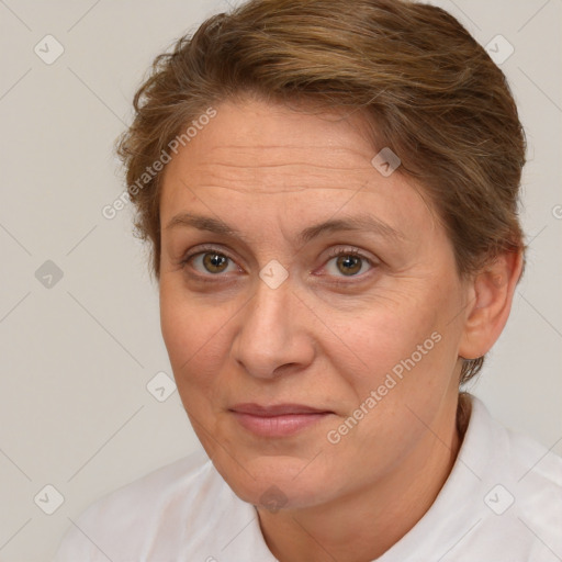 Joyful white adult female with short  brown hair and brown eyes