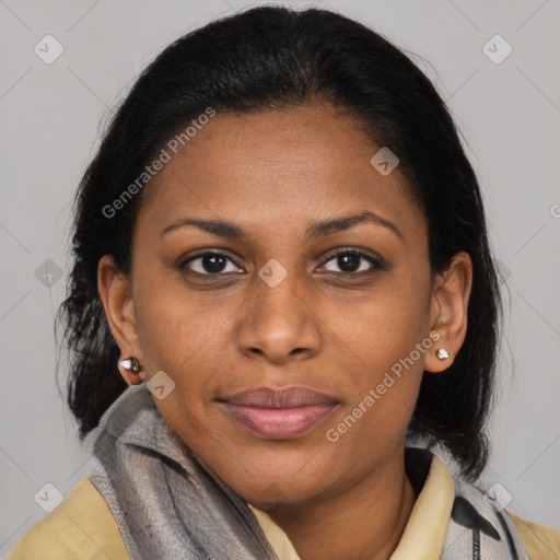 Joyful latino young-adult female with medium  brown hair and brown eyes